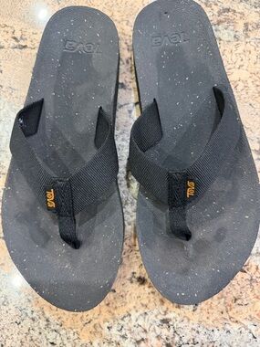 Teva Black Flip Flop Sandals with Small Orange Logo
